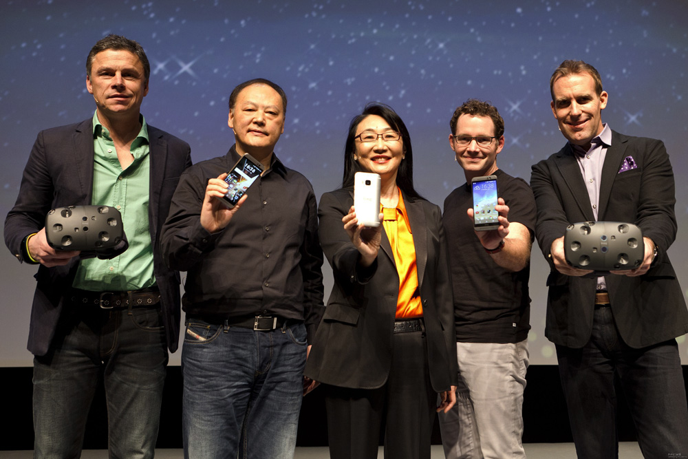 Gattis (right) on stage after introducing the HTC Vive at the Mobile World Conference in March.