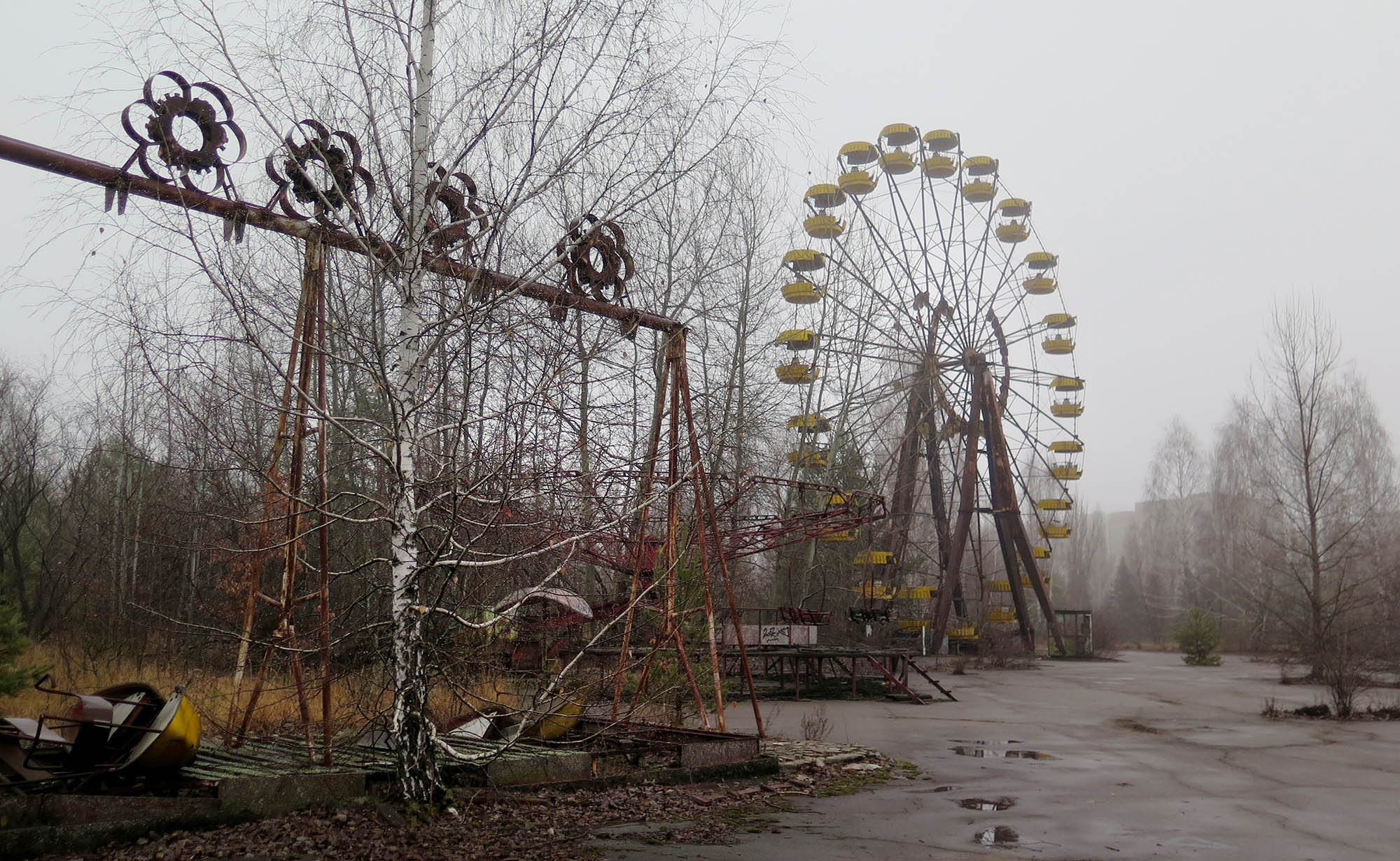 The swings and ferris wheel remain in an amusement park that was scheduled to open on May 1, 1986, for the Soviet May Day celebrations in Pirpyat, Ukraine. It never opened, as the Chernobyl disaster happened on April 26, 1986, a week before the opening.
