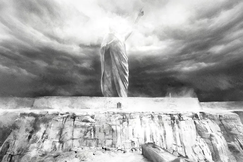 Emperor screenshot shows a giant statue in the distance, appearing like a black and white pencil drawing